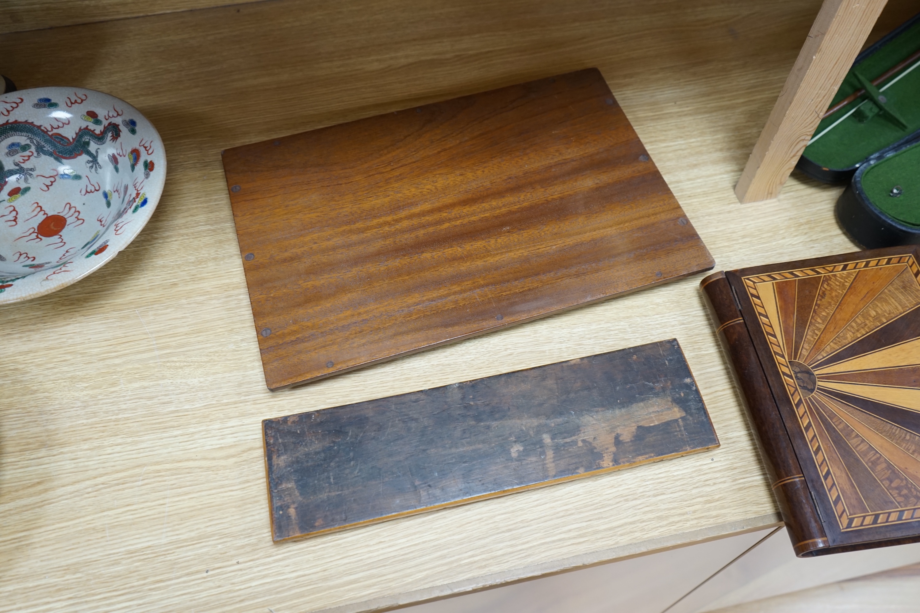 A specimen wood marquetry 'sunray' box, a marquetry tray and a Killarney yew wood bookrest, largest piece 46cm wide. Condition - some scuffs, otherwise good